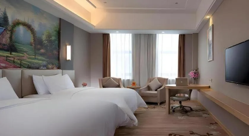 Bed in Vienna Hotel Jiangsu Zhangjiagang Passenger Terminal Station