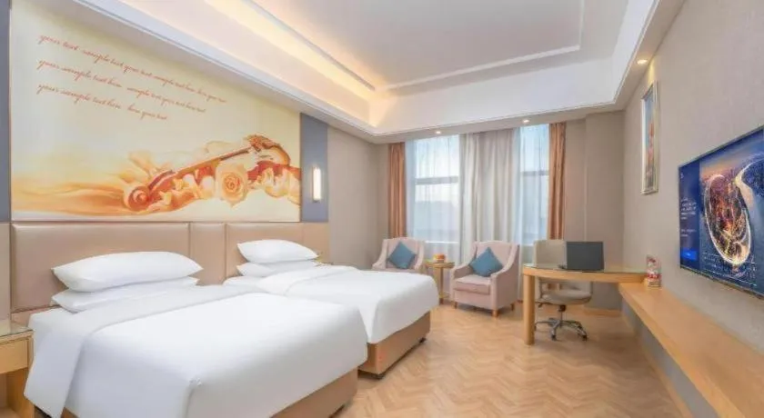 Bed in Vienna Hotel Jiangsu Zhangjiagang Passenger Terminal Station
