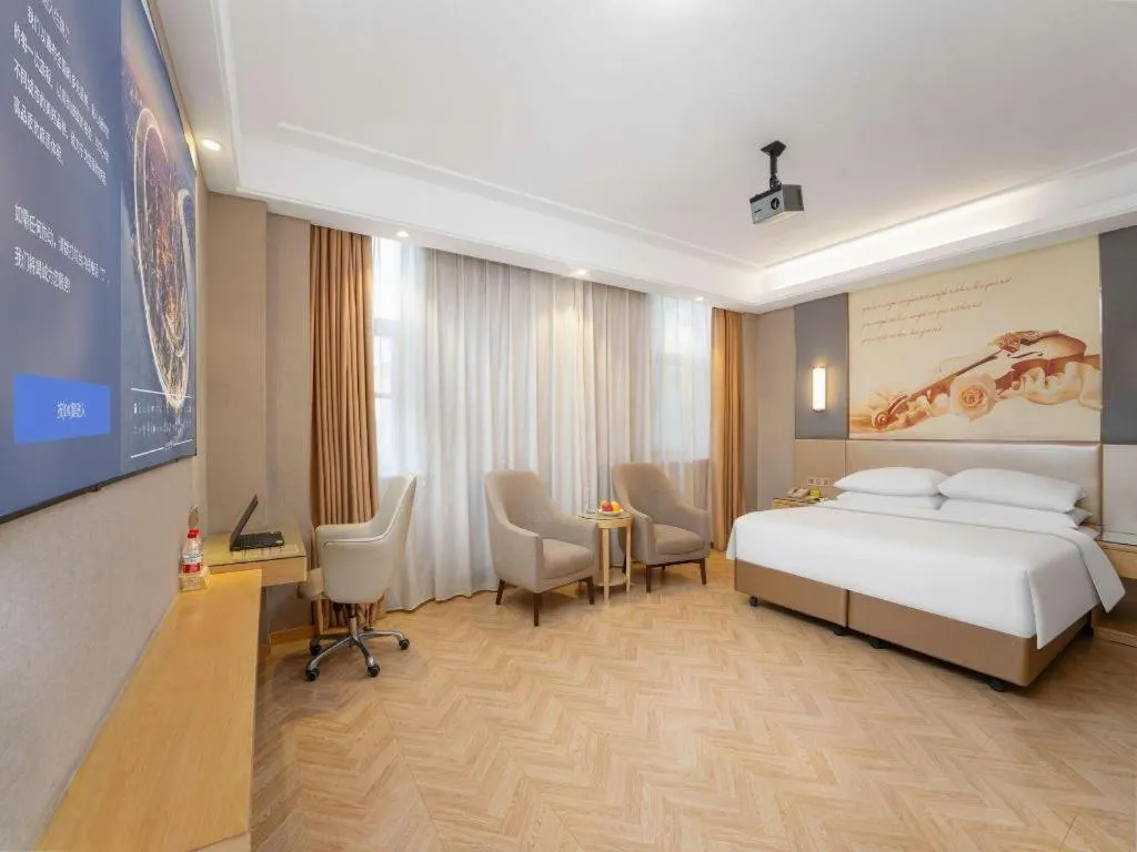 Bed in Vienna Hotel Jiangsu Zhangjiagang Passenger Terminal Station