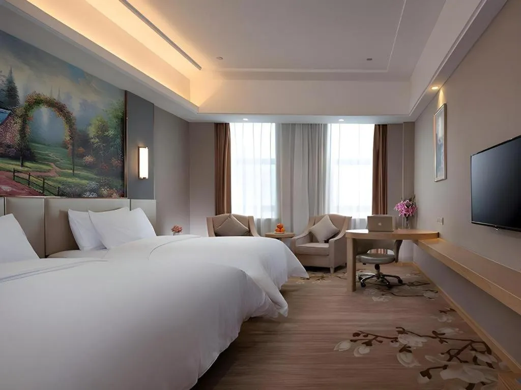 Bed in Vienna Hotel Jiangsu Zhangjiagang Passenger Terminal Station