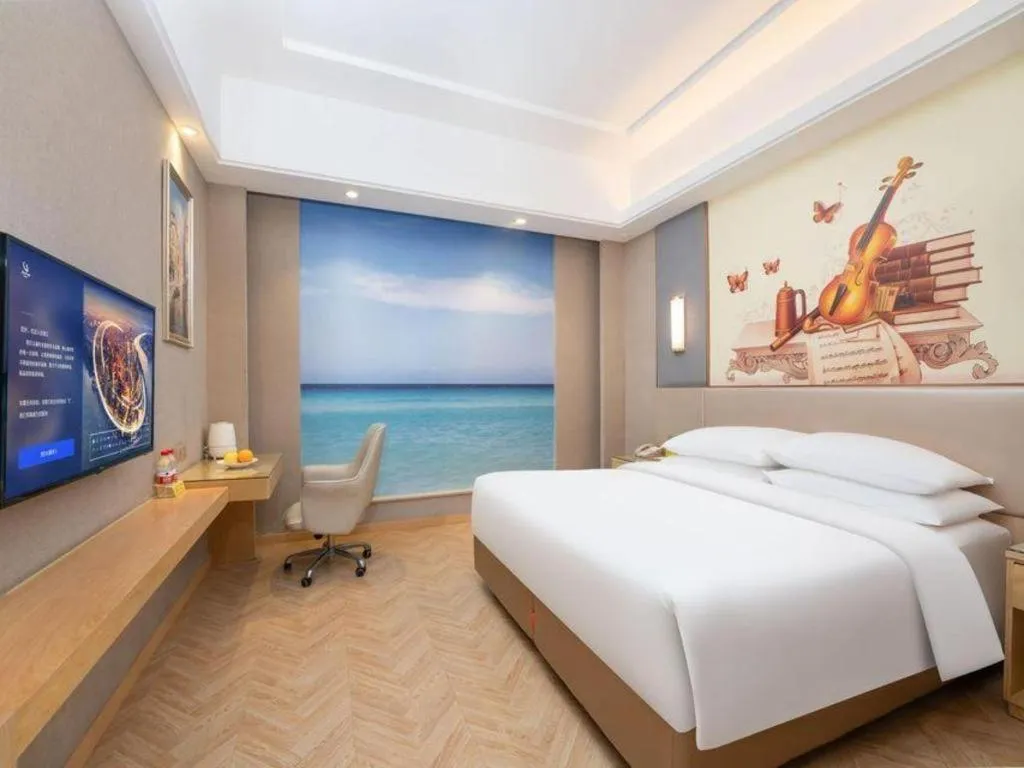 Bed in Vienna Hotel Jiangsu Zhangjiagang Passenger Terminal Station