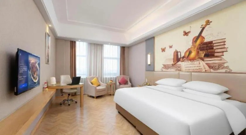 Bed in Vienna Hotel Jiangsu Zhangjiagang Passenger Terminal Station