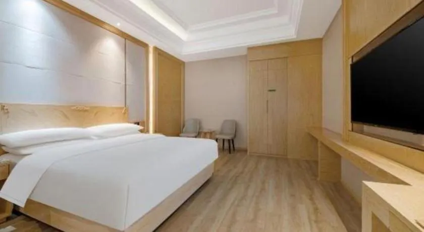 Bed in Vienna Hotel Jiangsu Kunshan Qiandeng Town