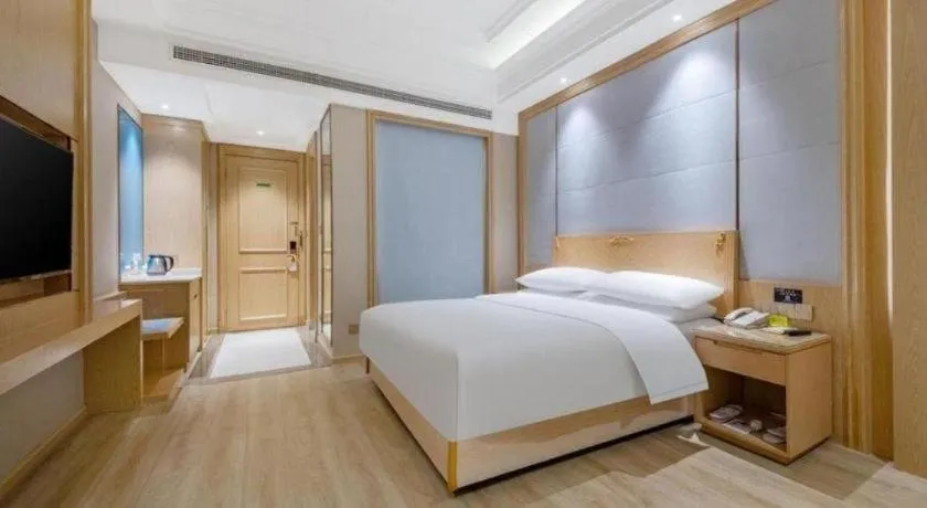 Bed in Vienna Hotel Jiangsu Kunshan Qiandeng Town