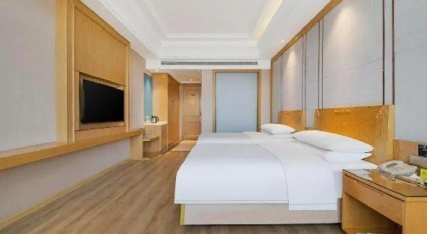 Bed in Vienna Hotel Jiangsu Kunshan Qiandeng Town