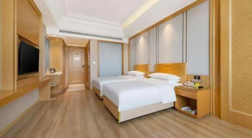 Bed in Vienna Hotel Jiangsu Kunshan Qiandeng Town