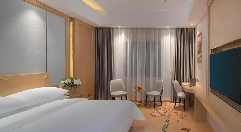 Bed in Vienna Hotel Jiangsu Kunshan Qiandeng Town