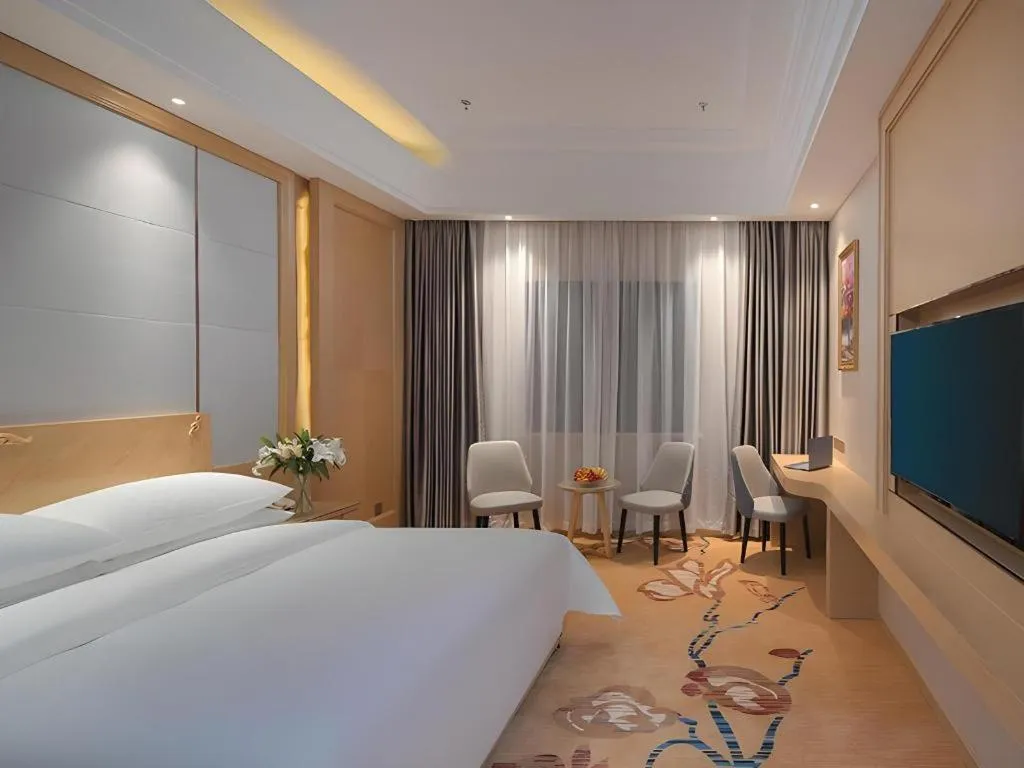 Bed in Vienna Hotel Jiangsu Kunshan Qiandeng Town