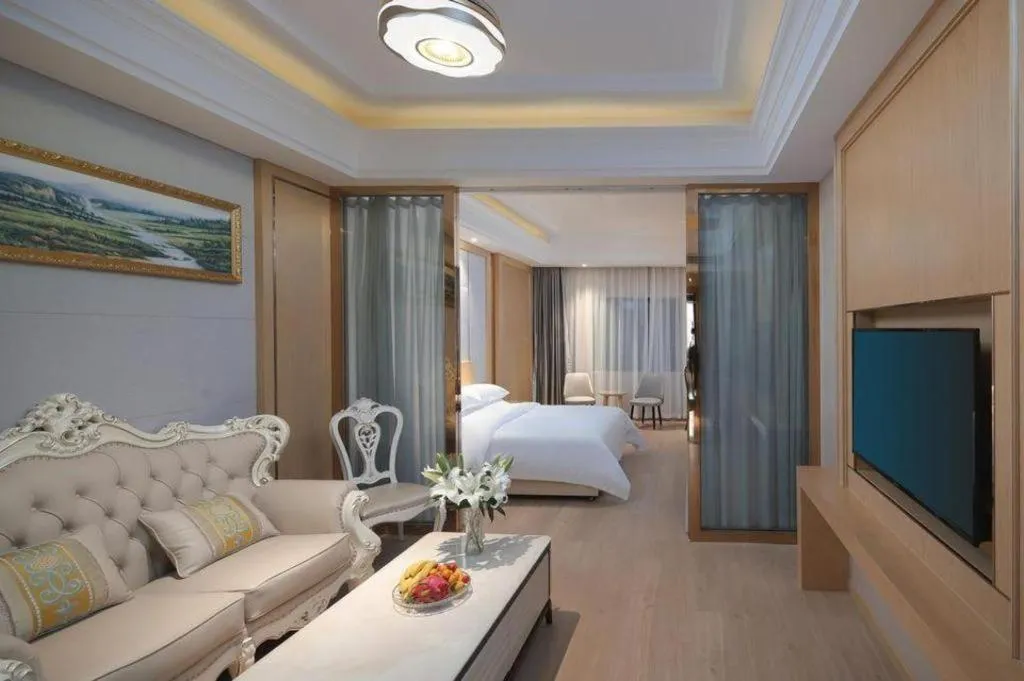 Bed in Vienna Hotel Jiangsu Kunshan Qiandeng Town