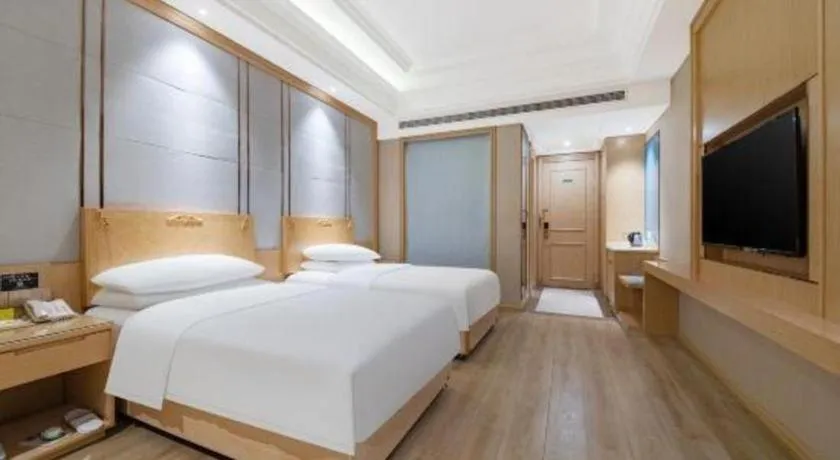 Bed in Vienna Hotel Jiangsu Kunshan Qiandeng Town
