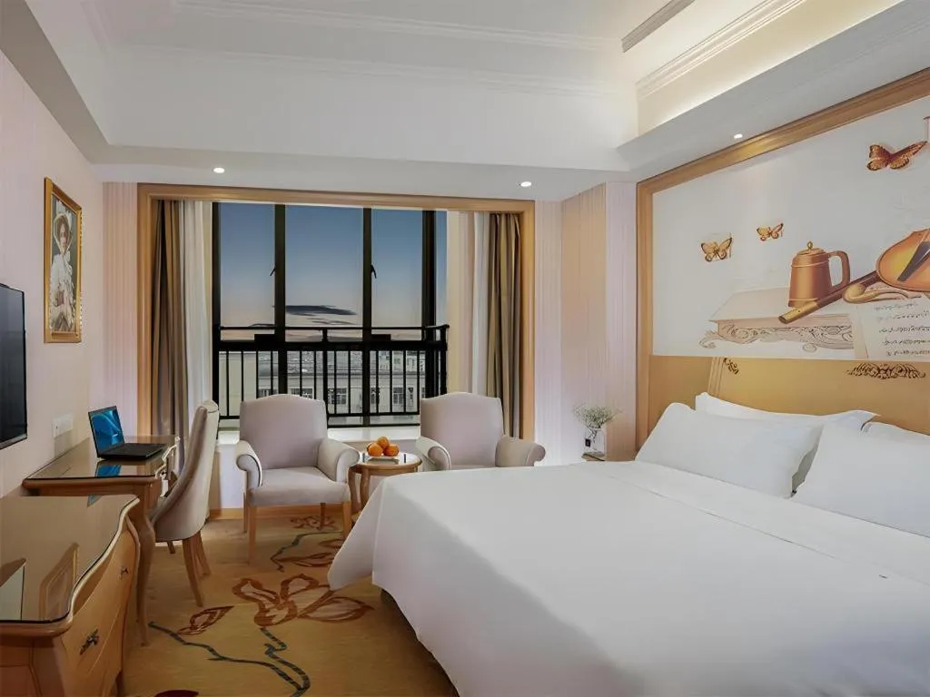 Bed in Vienna Hotel Guangzhou Huadu Sunac Cultural Tourism City Shiling