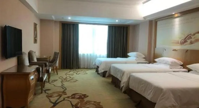 Bed in Vienna Hotel Guangzhou Huadu Sunac Cultural Tourism City Shiling