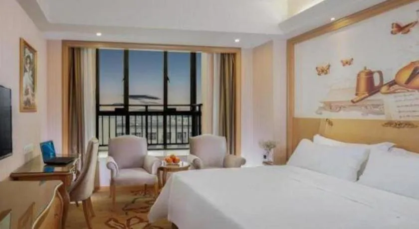 Bed in Vienna Hotel Guangzhou Huadu Sunac Cultural Tourism City Shiling