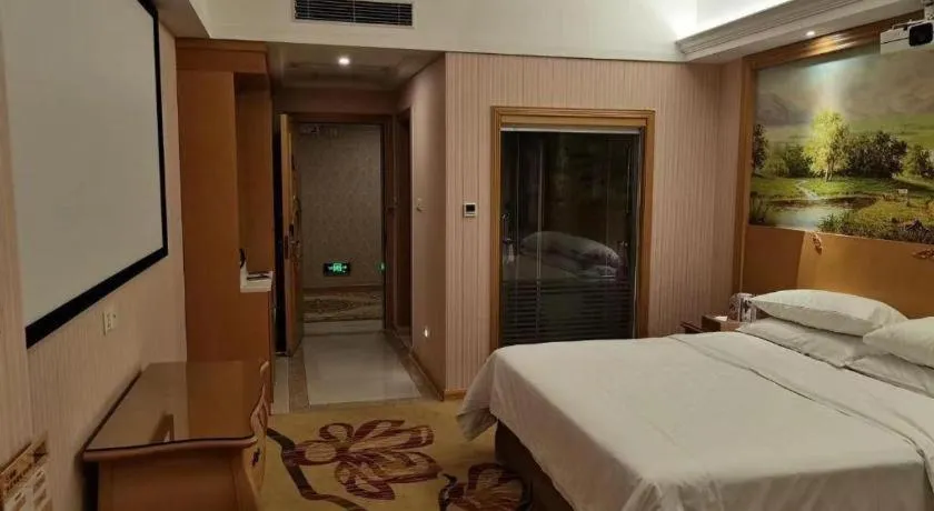 Bed in Vienna Hotel Guangzhou Huadu Sunac Cultural Tourism City Shiling