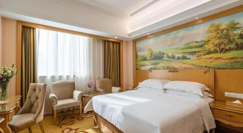 Bed in Vienna Hotel Guangzhou Huadu Sunac Cultural Tourism City Shiling