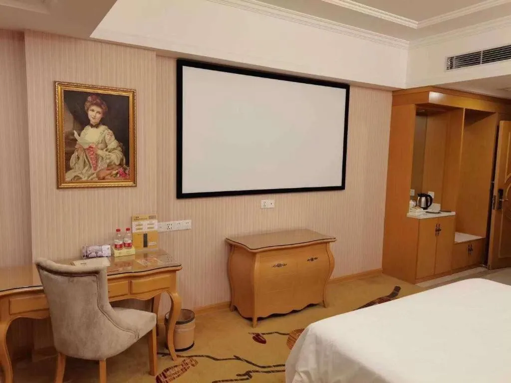 Bed in Vienna Hotel Guangzhou Huadu Sunac Cultural Tourism City Shiling