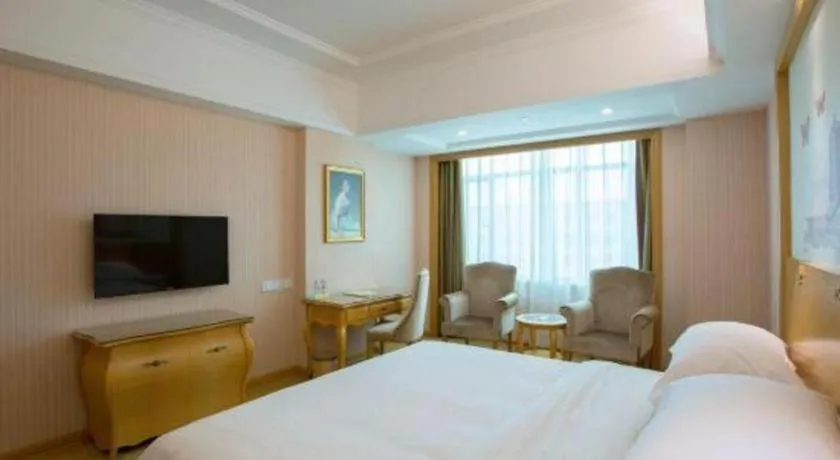 Bed in Vienna Hotel Guangzhou Huadu Sunac Cultural Tourism City Shiling