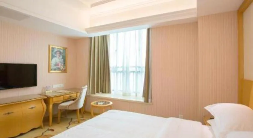 Bed in Vienna Hotel Guangzhou Huadu Sunac Cultural Tourism City Shiling