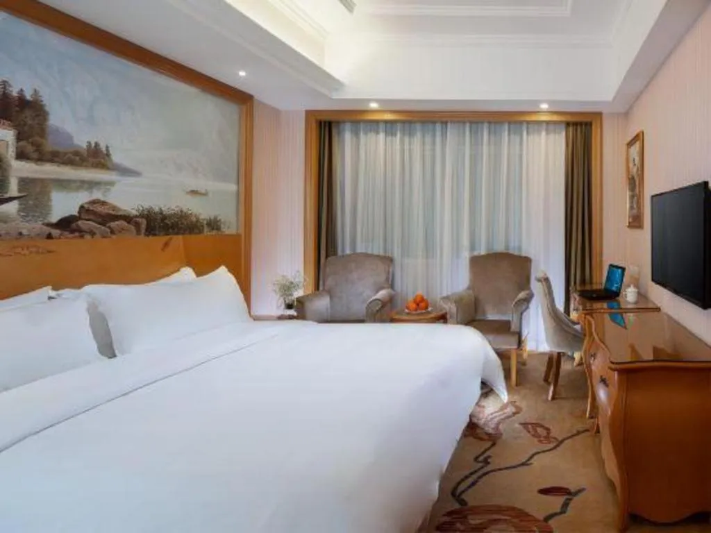 Bed in Vienna Hotel Guangzhou Huadu Sunac Cultural Tourism City Shiling