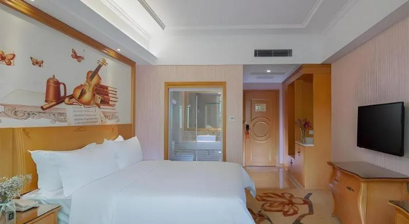 Bed in Vienna Hotel Guangzhou Huadu Sunac Cultural Tourism City Shiling