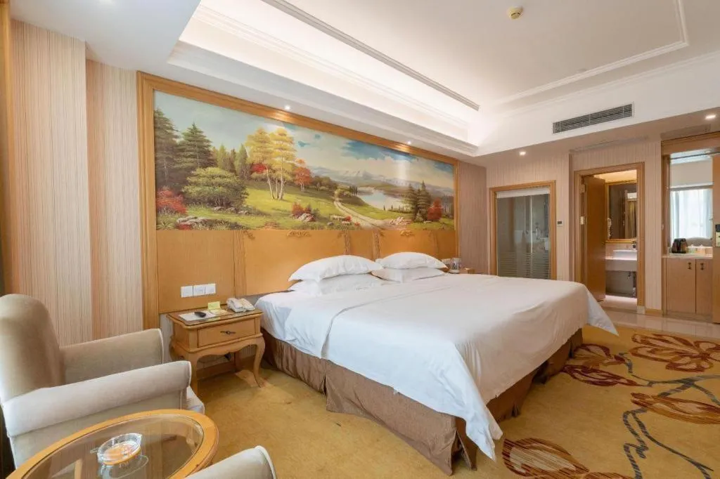 Bed in Vienna Hotel Guangzhou Huadu Sunac Cultural Tourism City Shiling