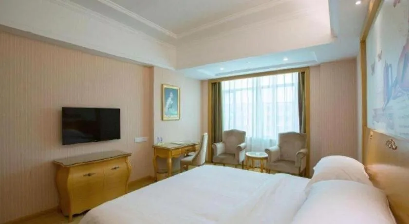Bed in Vienna Hotel Guangzhou Huadu Sunac Cultural Tourism City Shiling