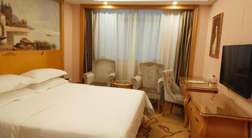 Bed in Vienna Hotel Guangzhou Huadu Sunac Cultural Tourism City Shiling