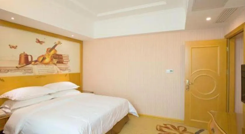 Bed in Vienna Hotel Guangzhou Huadu Sunac Cultural Tourism City Shiling