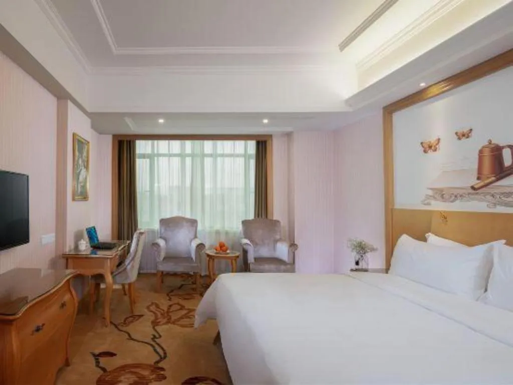 Bed in Vienna Hotel Guangzhou Huadu Sunac Cultural Tourism City Shiling