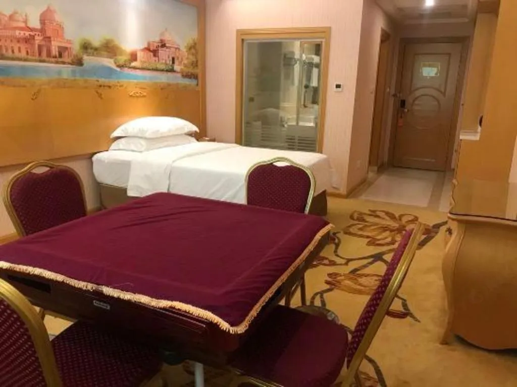 Bed in Vienna Hotel Guangzhou Huadu Sunac Cultural Tourism City Shiling