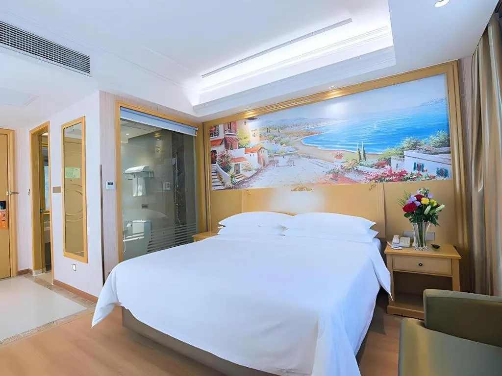Bed in Vienna Hotel Hubei Xiangyang Tang City Gulou