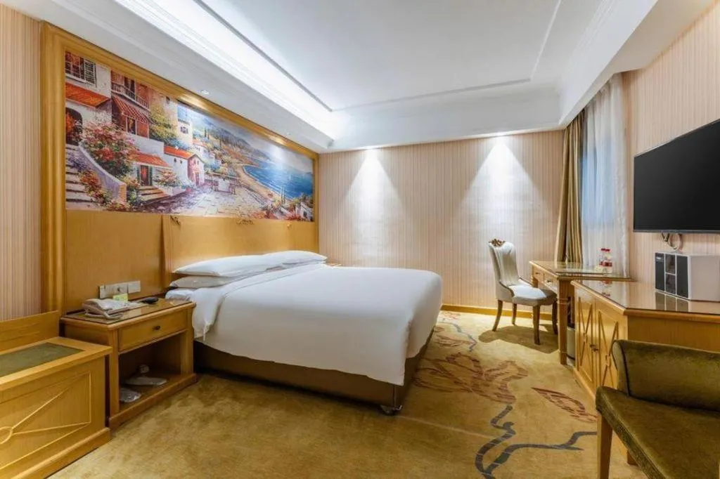 Bed in Vienna Hotel Hubei Xiangyang Tang City Gulou