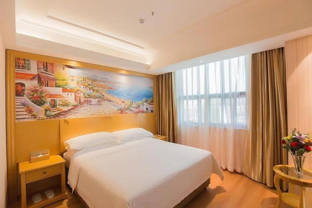 Bed in Vienna Hotel Hubei Xiangyang Tang City Gulou
