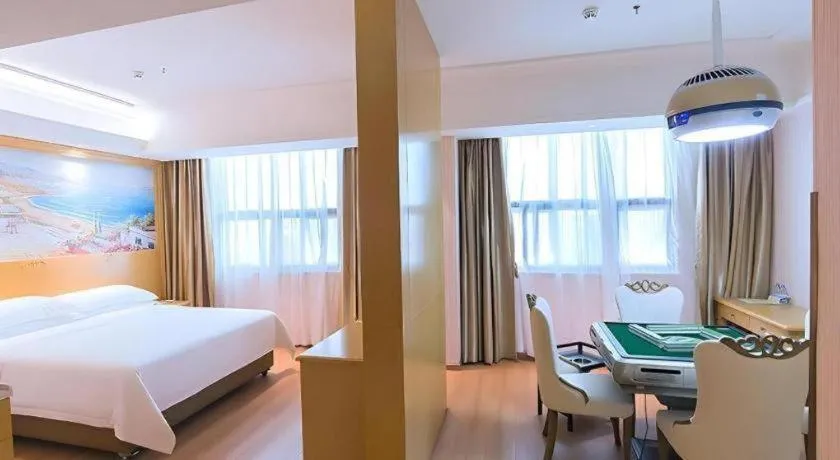 Bed in Vienna Hotel Hubei Xiangyang Tang City Gulou