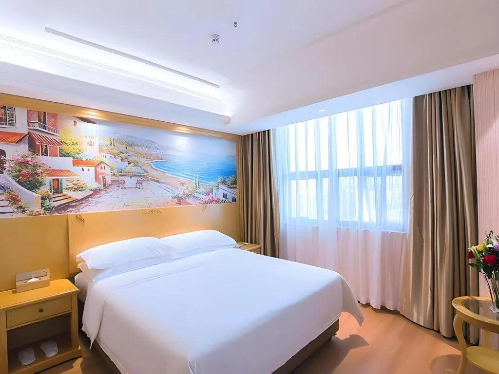 Bed in Vienna Hotel Hubei Xiangyang Tang City Gulou