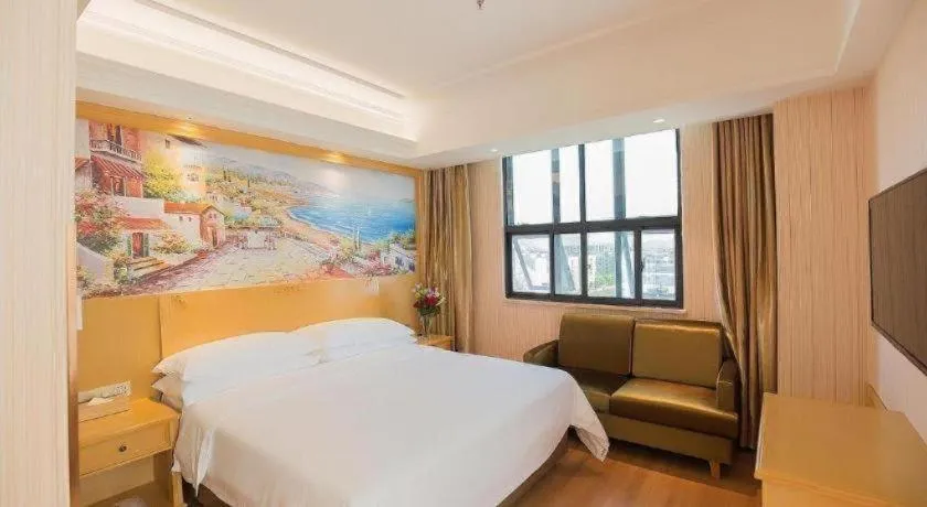 Bed in Vienna Hotel Hubei Xiangyang Tang City Gulou