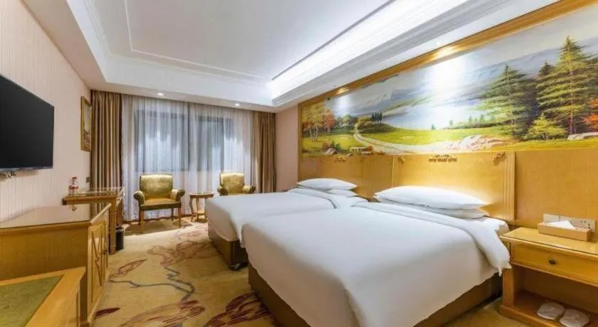 Bed in Vienna Hotel Hubei Xiangyang Tang City Gulou