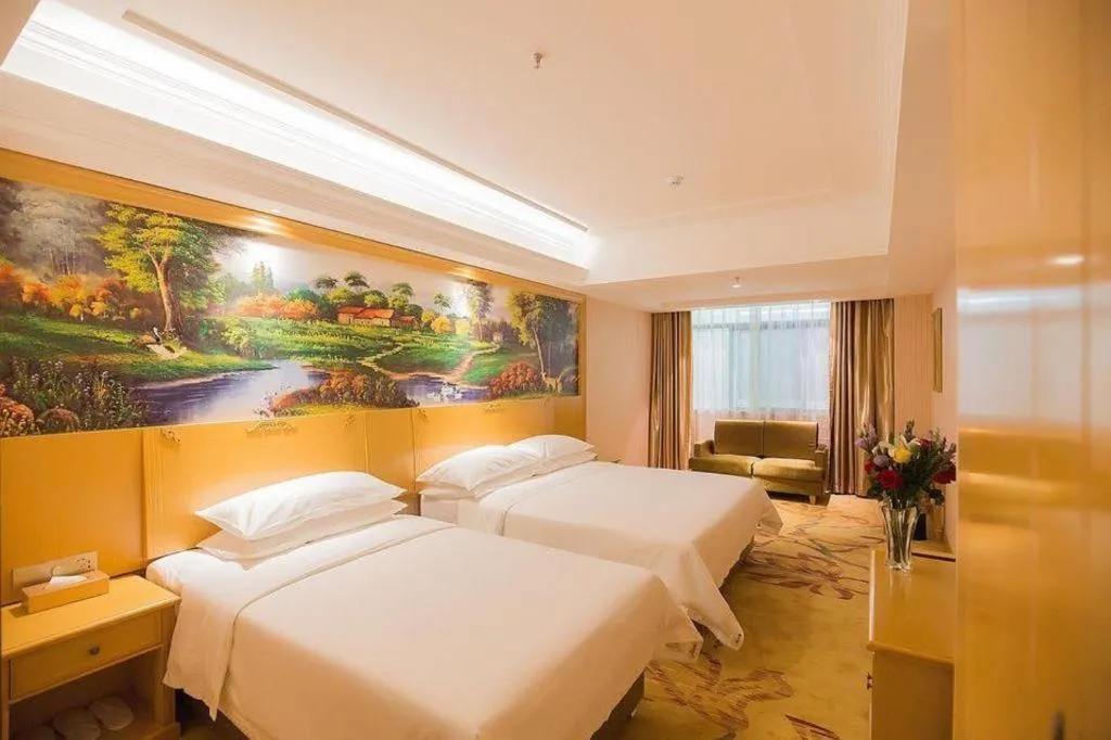Bed in Vienna Hotel Hubei Xiangyang Tang City Gulou