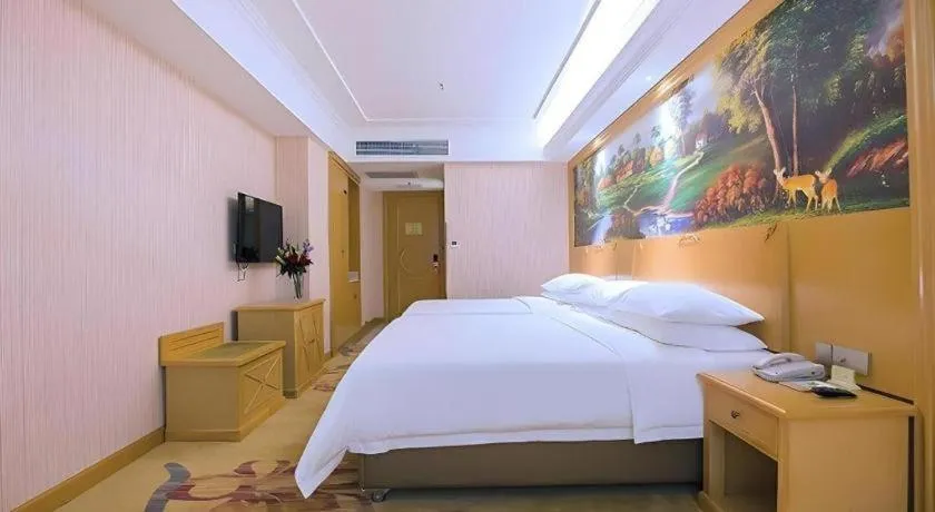 Bed in Vienna Hotel Hubei Xiangyang Tang City Gulou