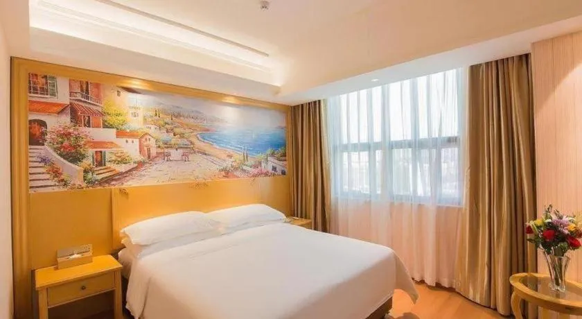 Bed in Vienna Hotel Hubei Xiangyang Tang City Gulou