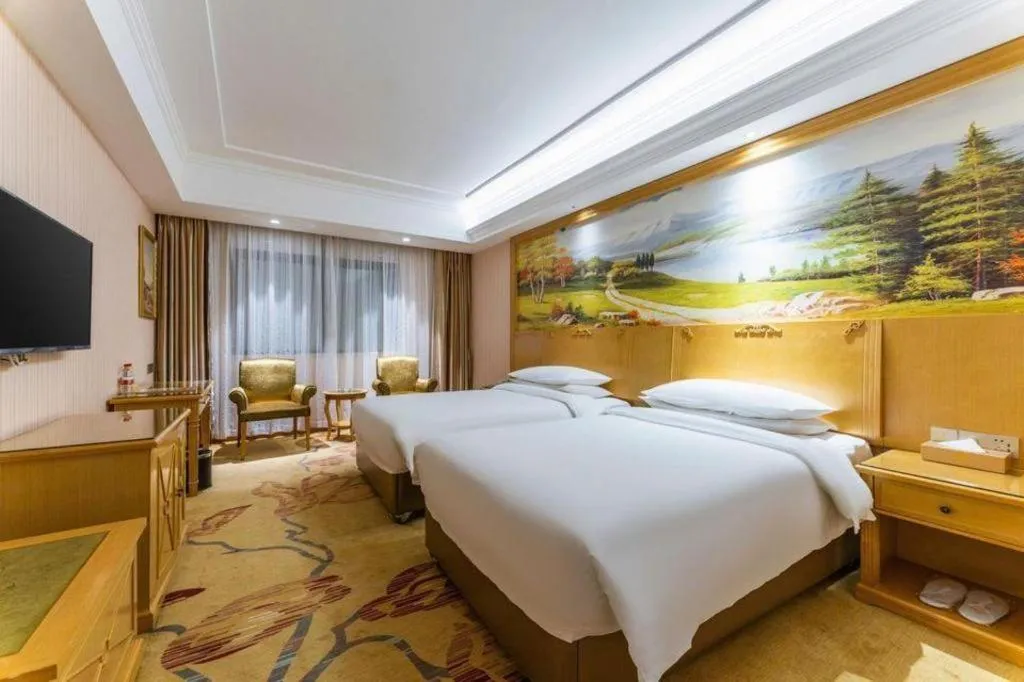 Bed in Vienna Hotel Hubei Xiangyang Tang City Gulou