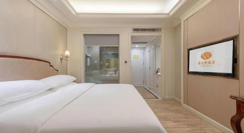 Bed in Vienna Hotel Guangzhou Baiyun College Jinyuan Plaza