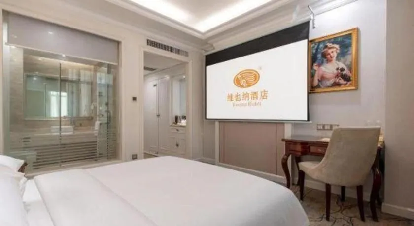 Bed in Vienna Hotel Guangzhou Baiyun College Jinyuan Plaza