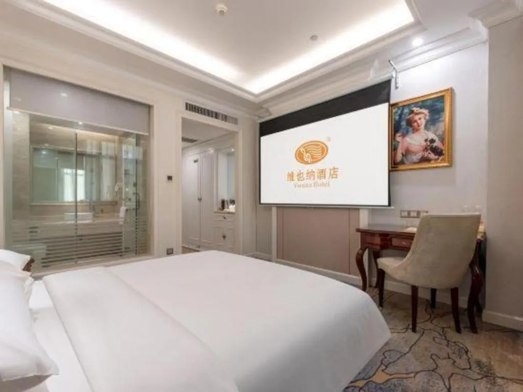 Bed in Vienna Hotel Guangzhou Baiyun College Jinyuan Plaza