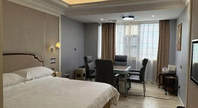 Bed in Vienna Hotel Guangzhou Baiyun College Jinyuan Plaza