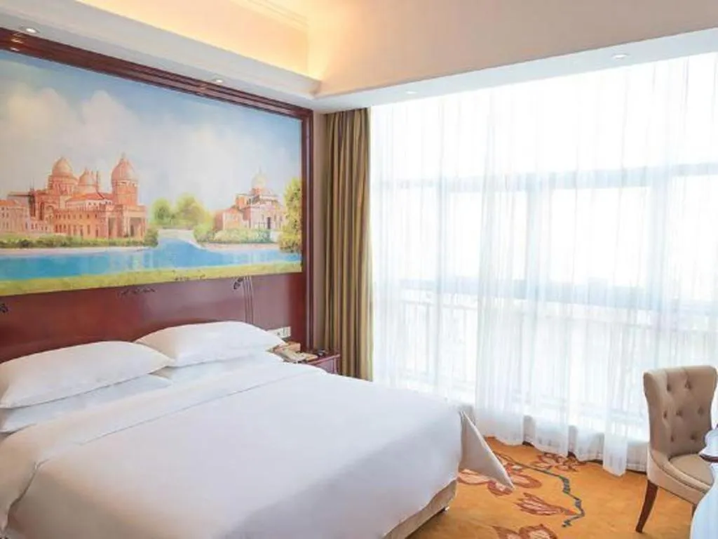 Bed in Vienna Hotel Jiangxi Ji'an Anfu