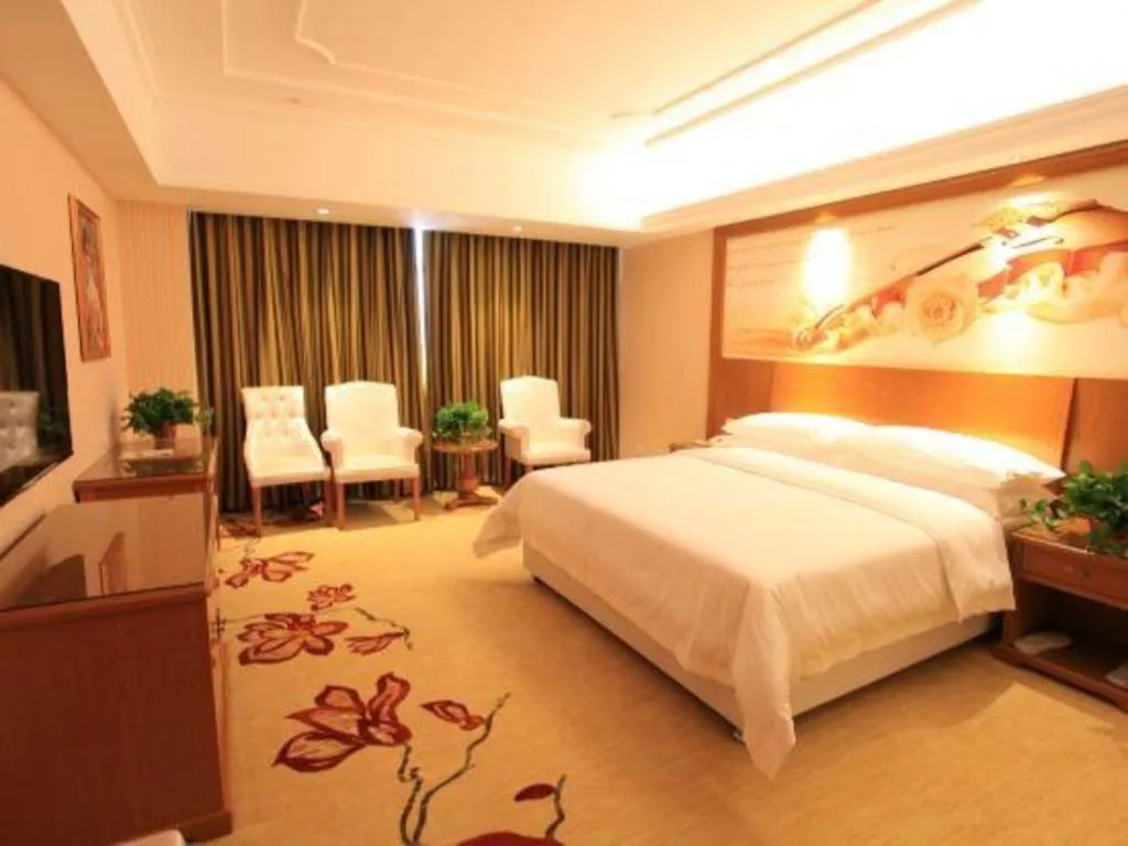 Bed in Vienna Hotel Jiangxi Ji'an Anfu