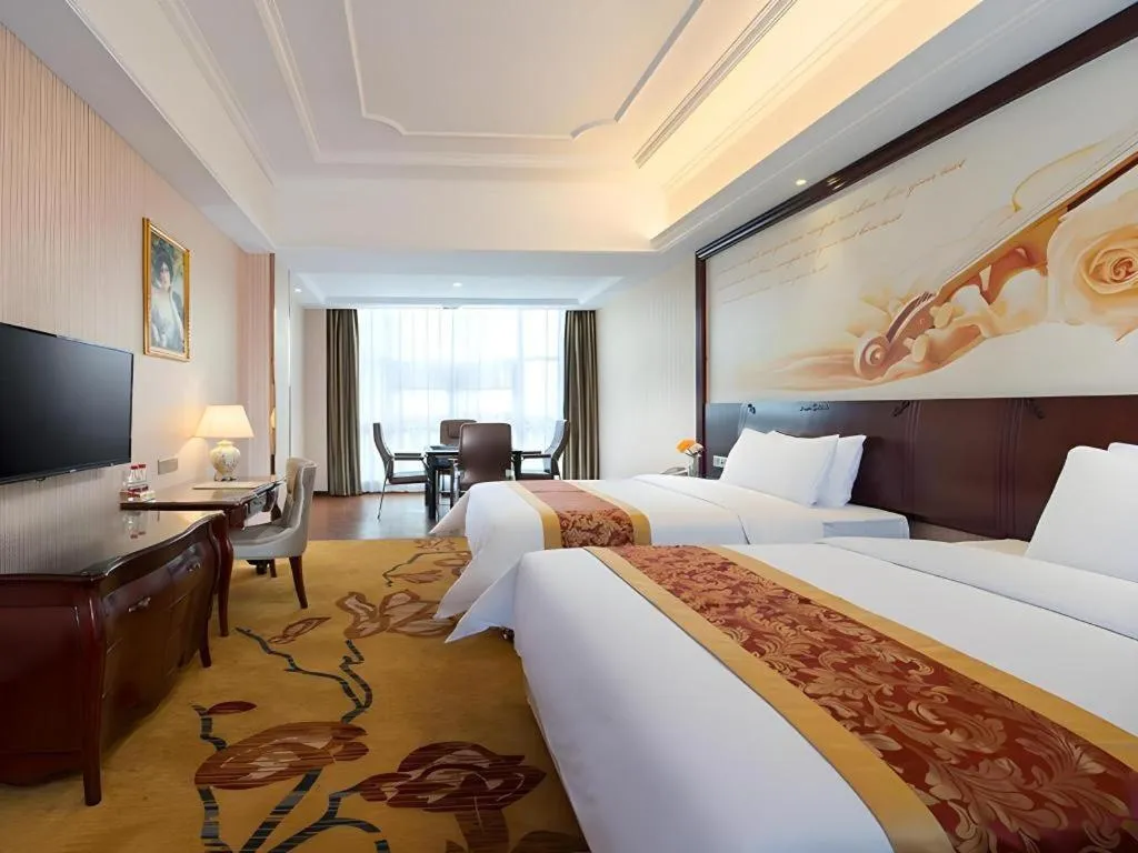 Bed in Vienna Hotel Jiangxi Ji'an Anfu