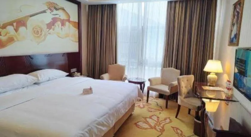 Bed in Vienna Hotel Jiangxi Ji'an Anfu