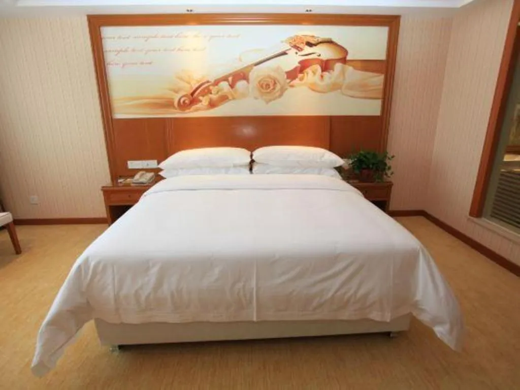 Bed in Vienna Hotel Jiangxi Ji'an Anfu